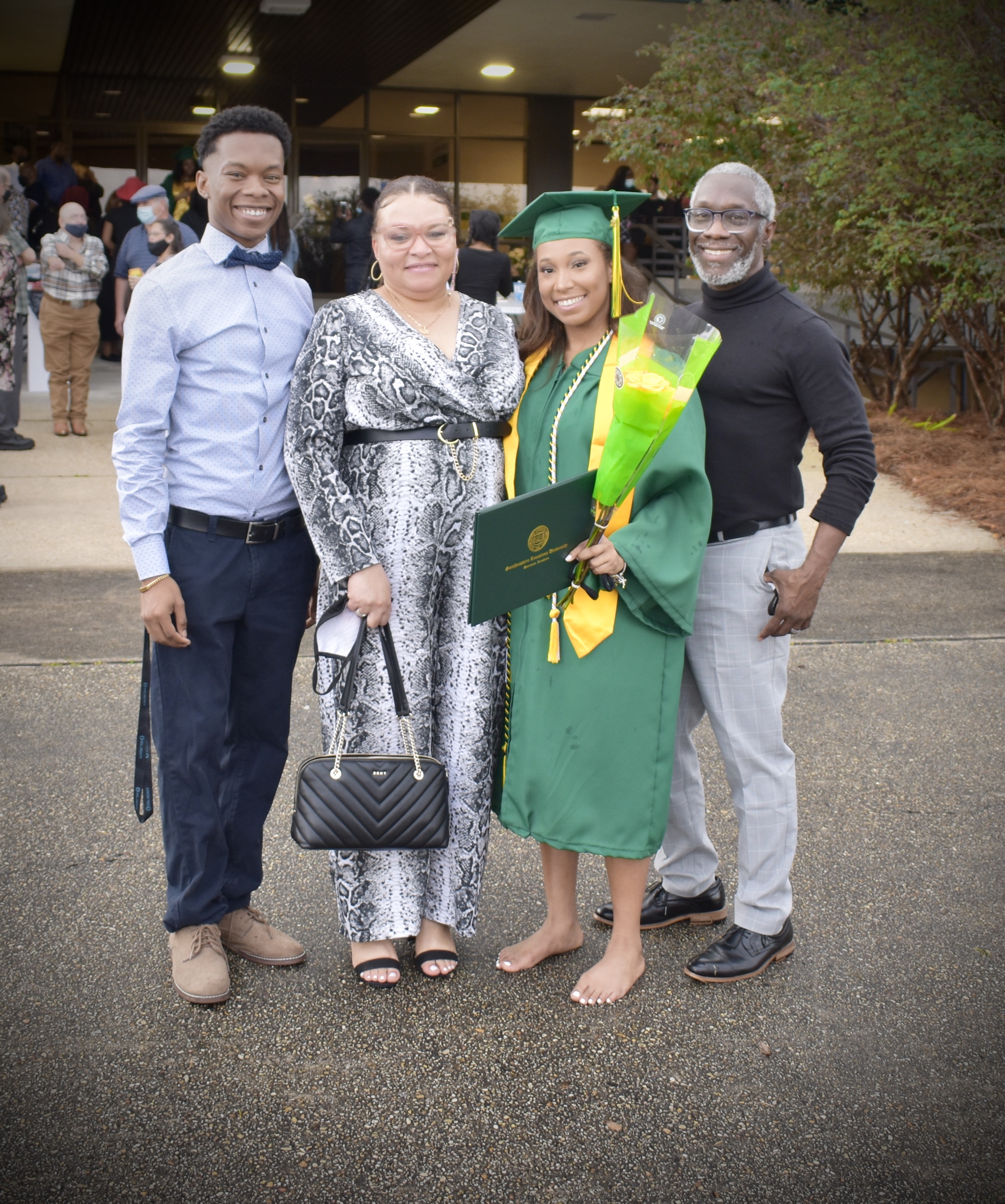 Kamian graduating with family 