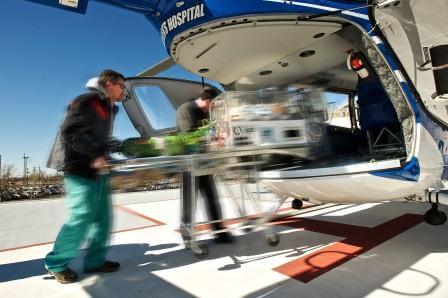 Patient being pushed into an evac helicoptor