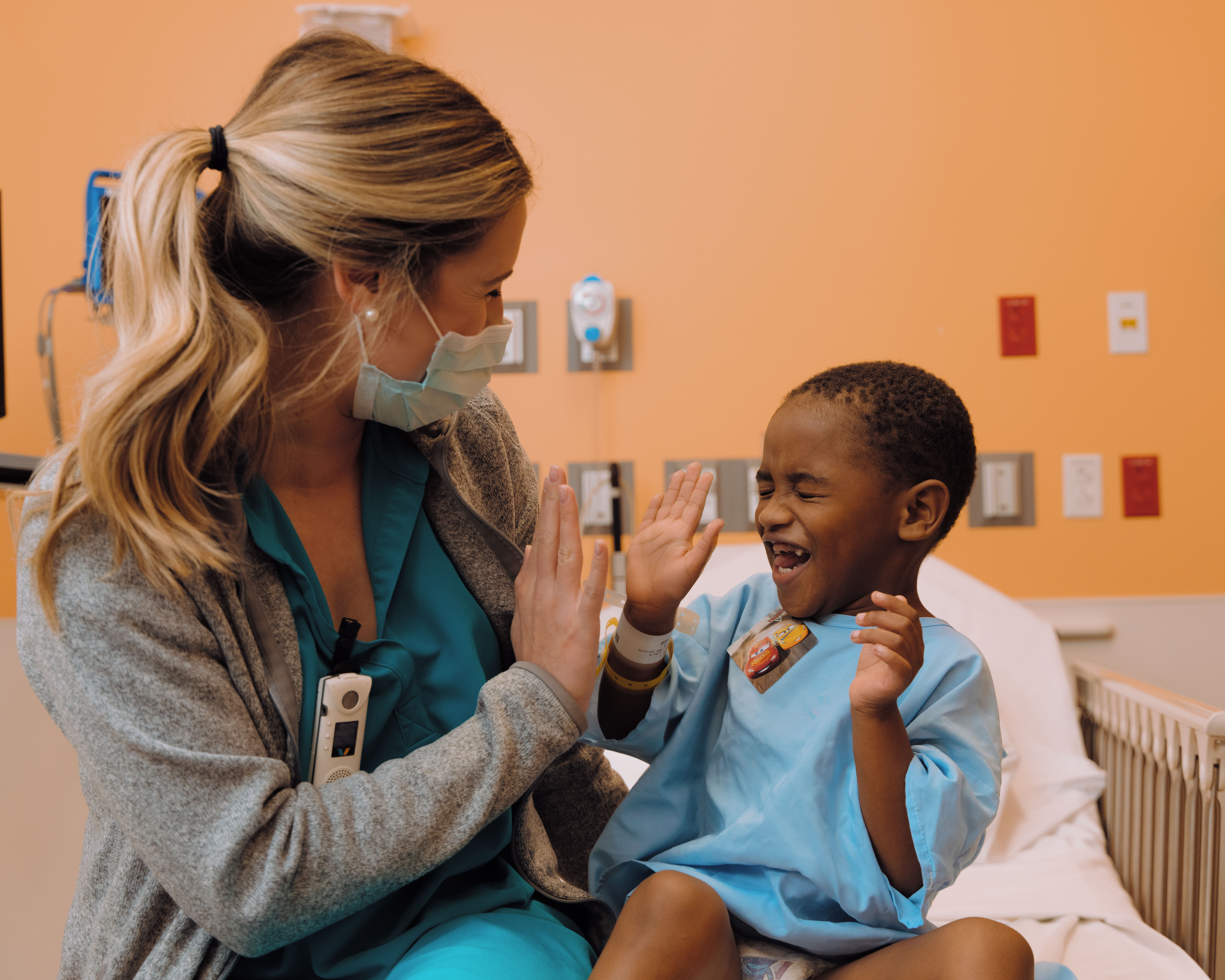 smiling little boy with nurse