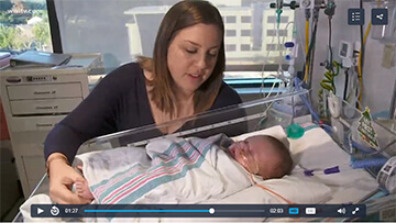 mother with baby in NICU